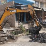 उझानी नगर पालिका ने चलाया नाला सफाई अभियान